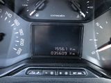 a close up of a car dashboard with a speedometer