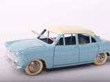 a toy car that is sitting on a white surface