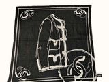 black and white scarf with a picture of a jacket on it