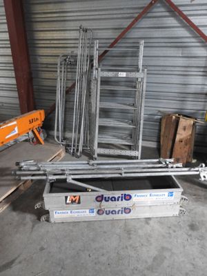 a large pile of metal items in a garage