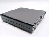 a black laptop sitting on top of a white table