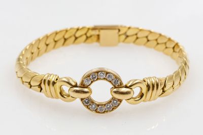 Bracelet en or à maille anglaise centré d'un motif circulaire serti de - Photo 1