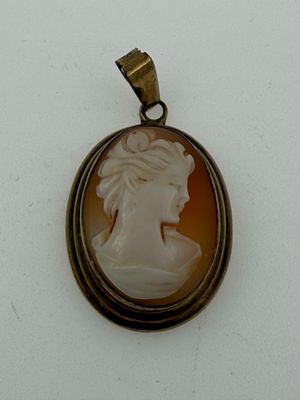 a picture of a picture of a woman in a cameo pendant