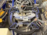 a pile of hoses and other tools in a store