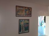 two framed movie posters on the wall of a room