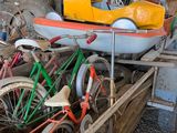 many different types of toys in a wooden box
