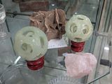 a glass display case with a lot of glass items on it
