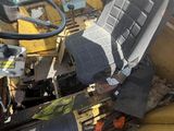 a picture of a tractor with a seat and a steering wheel
