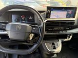 the interior of a car with a steering wheel, dashboard, and dash board