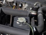 a close up of a car ' s engine with its hood open