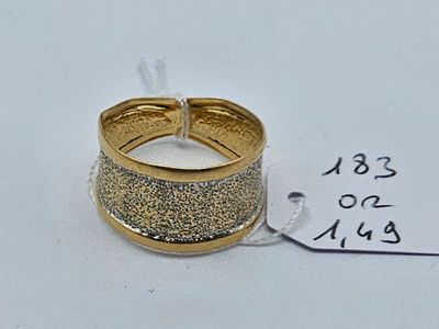 an image of a gold ring with glitter on it