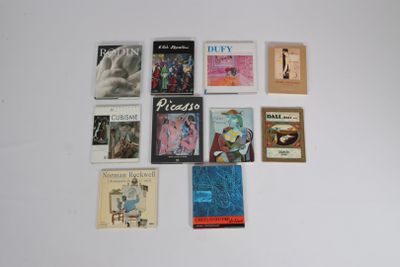 a lot of books that are on the table