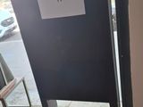 a mirror on the floor in the corner of a room