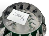 a small glass jar with a label on it