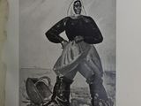 un vieux livre avec la photo d'une femme en tenue de ski