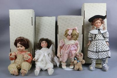 five dolls that are sitting next to each other