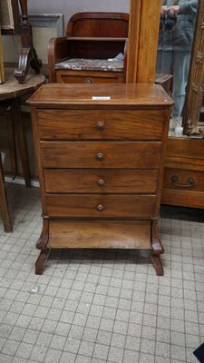 a wooden dresser with a mirror on top of it
