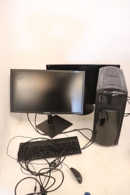 a desktop computer sitting on a desk with a keyboard and mouse