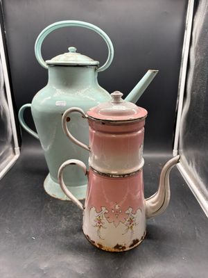 two teapots sitting next to each other on a shelf