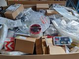 a box full of electronic devices and other items in it