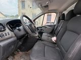 a picture of the inside of a truck with the driver ' s seat down