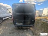 a van that is parked on the side of the road