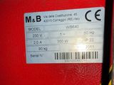 a picture of a red machine with a barcode on it
