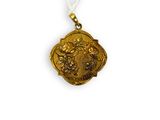an image of a gold medal on a white string