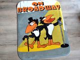 un tapis sur lequel sont représentés un pingouin et un oiseau pingouin