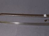 two knives that are laying on a table