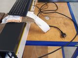 a desk with a keyboard and a monitor on it