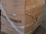 a large cardboard box sitting on a pallet in a warehouse