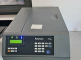 an image of a computer and a printer on a desk