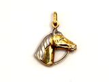 gold plated horse head pendant on a white background