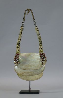 an image of a necklace made of glass and beads