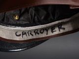 an image of a cap with the word carrier written on it