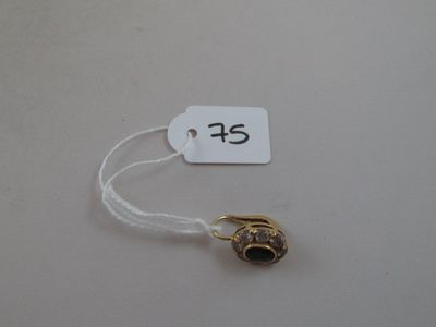 a tag that has a small bell on it