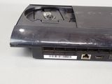 a close up of a laptop with a barcode on it