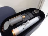 an image of a hair dryer and brush in a case