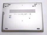a close up of a silver laptop with a white background