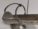 a metal object that is sitting on the floor