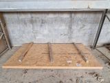 a picture of a wooden floor in a garage