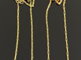 a pair of gold and lapis lariage earrings