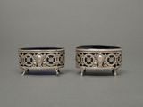 pair of silverplated bowls with handles and handles