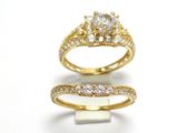 deux bagues en or serties de diamants sur fond blanc