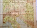 an old map of europe on a table in a room