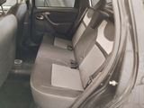the back seats of a car are empty and the passenger seat is empty