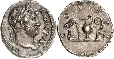 a silver coin with an image of a man and a horse on it