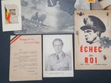 a collection of military memorabilia on display on a table