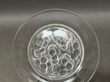 a clear glass plate with a circular design on it